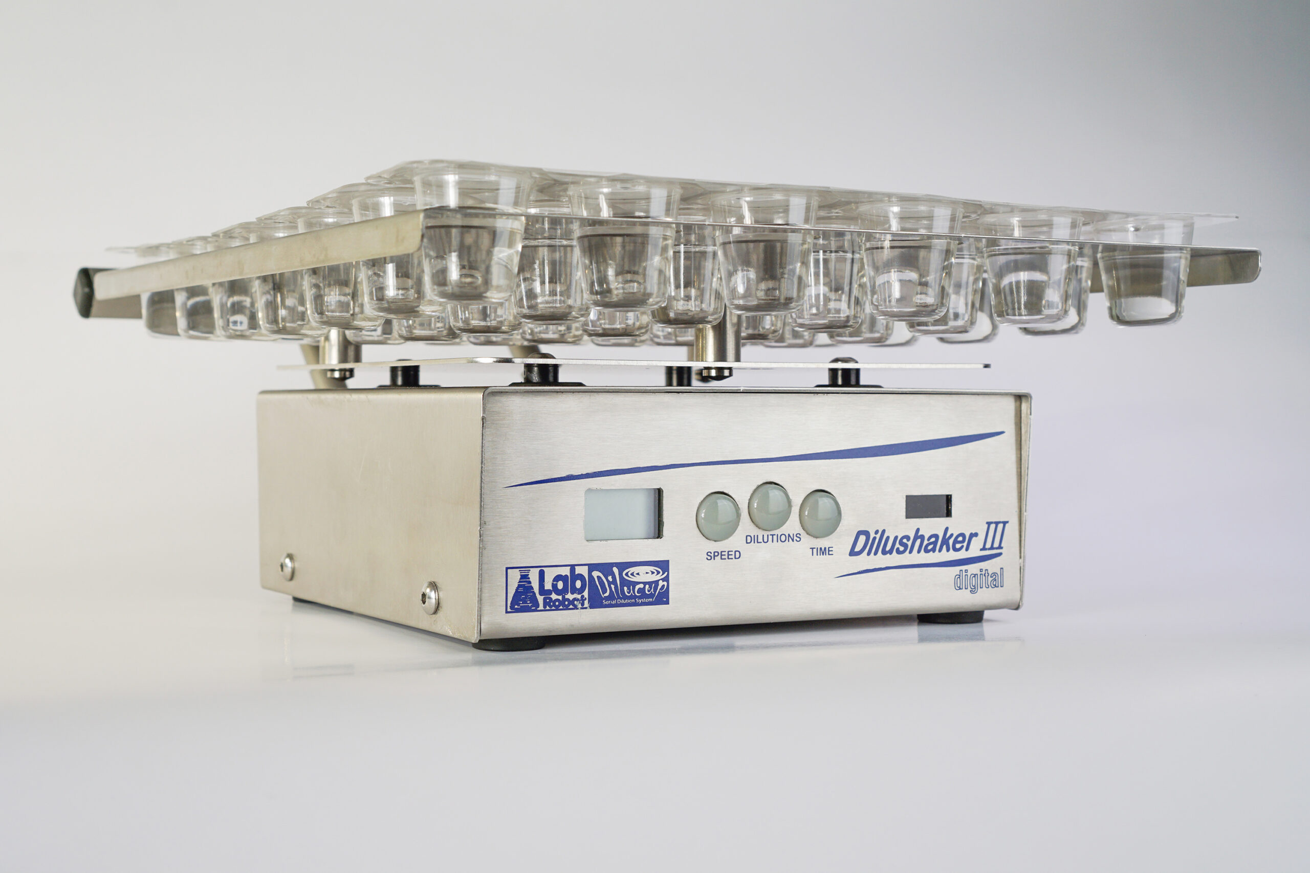 dilushaker with a blister of dilucups. for serial dilutions